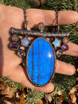 Blue flash stained glass window amulet