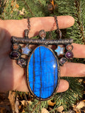 Blue flash stained glass window amulet